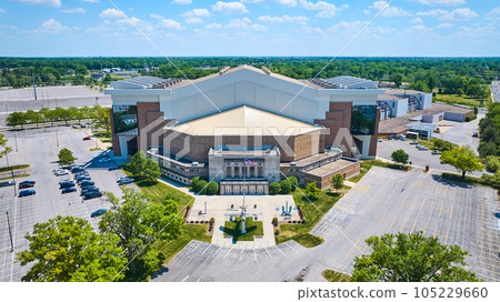 Allen Country War Memorial Coliseum aerial with airplane and American flag 105229660