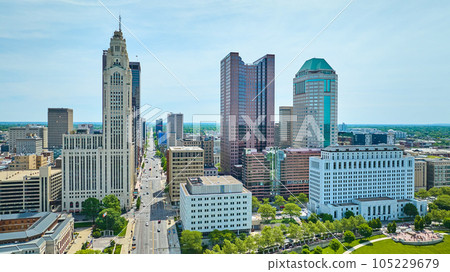 Iconic skyscrapers downtown Columbus Ohio aerial with main road cutting through city Iconic skyscrapers downtown Columbus Ohio aerial with main road cutting through city 105229679