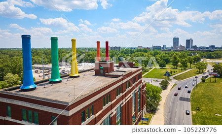 Gorgeous blue sky day with white puffy clouds over Science Central and Fort Wayne city aerial Gorgeous blue sky day with white puffy clouds over Science Central and Fort Wayne city aerial 105229776