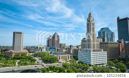 Aerial blue skies over downtown Columbus Ohio with LeVeque Tower aerial Aerial blue skies over downtown Columbus Ohio with LeVeque Tower aerial 105229856