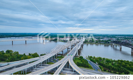 Aerial from Kentucky side Ohio River looking over bridgest toward Indiana near Louisville 105229862