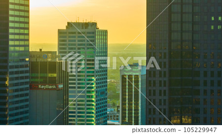 Hazy golden morning light between skyscraper buildings in downtown Columbus Ohio aerial Hazy golden morning light between skyscraper buildings in downtown Columbus Ohio aerial 105229947