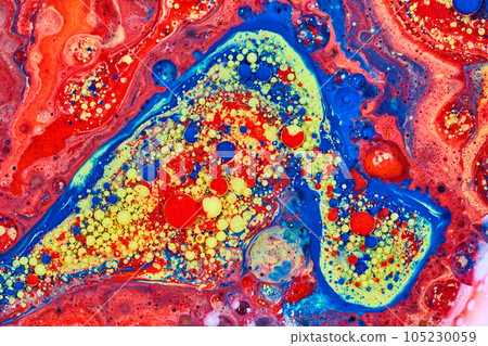 Swirling blue red and yellow acrylic paint with oil and milk bubbles and spheres in abstract galactic background asset 105230059