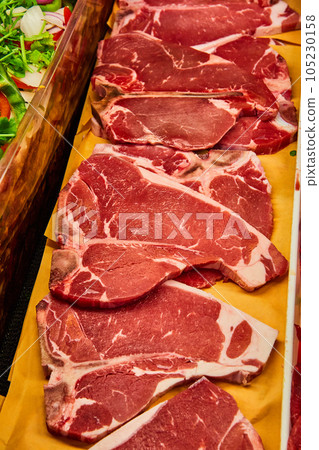 Raw cuts of t-bone steaks Raw cuts of t-bone steaks 105230158