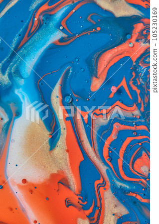 Vertical background asset of abstract acrylic painting of jagged oil spill with gold orange and blue 105230169