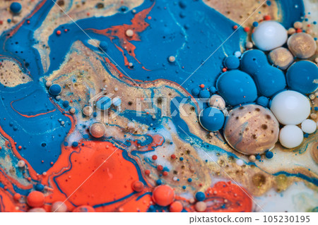 Cluster of pearls in painting during abstract acrylic pouring of light blue shiny gold and rusty orange with milk and oil in background asset 105230195
