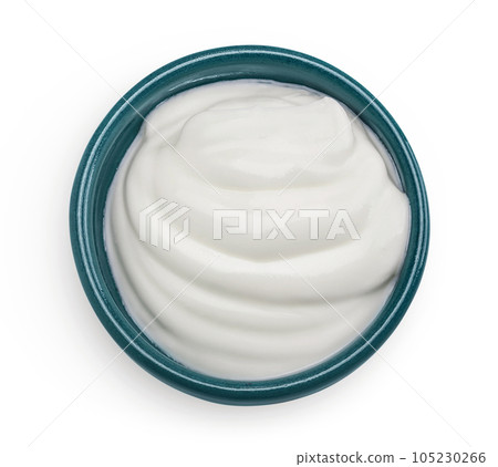sour cream or yogurt in ceramic bowl isolated on white background with full depth of field. Top view. Flat lay sour cream or yogurt in ceramic bowl isolated on white background with full depth of field. Top view. Flat lay 105230266