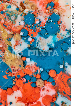 Cosmic abstract acrylic pour background asset with oil circles of blue white gold and orange Cosmic abstract acrylic pour background asset with oil circles of blue white gold and orange 105230355