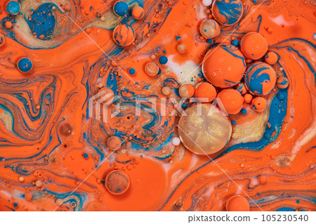 Horizontal background asset of galactic painting with golden circular bubble and globes of swirling blue and orange in abstract painting Horizontal background asset of galactic painting with golden circular bubble and globes of swirling blue and orange in abstract painting 105230540