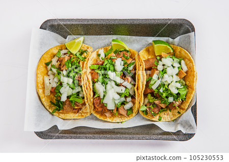 Asset three lengua cow tongue street tacos with lime wedges Asset three lengua cow tongue street tacos with lime wedges 105230553