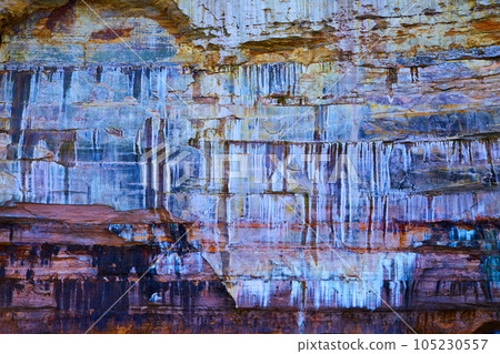 Flat stone walls of pictured rocks with white and red dripping painted effect Flat stone walls of pictured rocks with white and red dripping painted effect 105230557