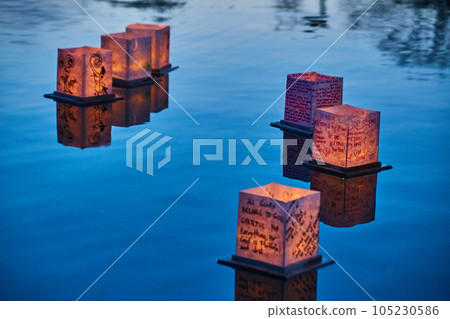 Calm water with six Japanese style lanterns Calm water with six Japanese style lanterns 105230586