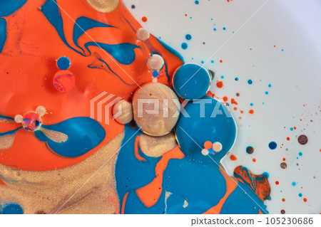 Vertical abstract painting asset with white background and flecks of blue gold and orange acrylic paint with oil bubbles in a cluster Vertical abstract painting asset with white background and flecks of blue gold and orange acrylic paint with oil bubbles in a cluster 105230686