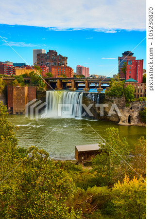 Waterfall over cliffs right inside city of Rochester in early fall Waterfall over cliffs right inside city of Rochester in early fall 105230820
