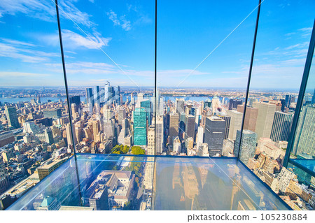 Glass floor in Summit One Skyscraper New York City overlooking Manhattan Glass floor in Summit One Skyscraper New York City overlooking Manhattan 105230884
