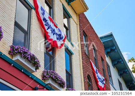 Red, white, and blue colors on exterior of downtown building 105231564