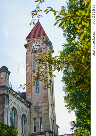 Stunning limestone clock tower on college campus in Bloomington 105231612