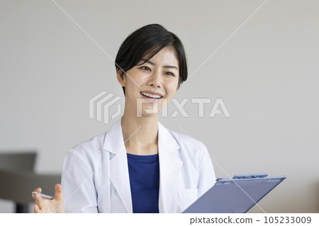 Image of a young female doctor giving an interview 105233009