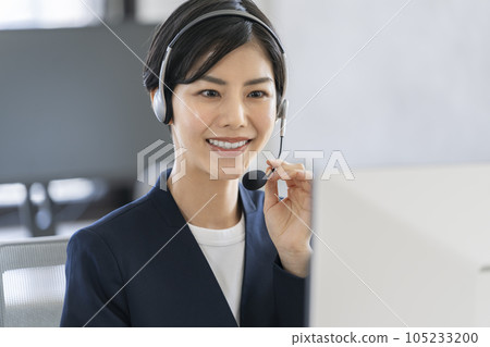 Operator talking with a smile Operator talking with a smile 105233200