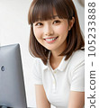 young woman working on computer 105233888
