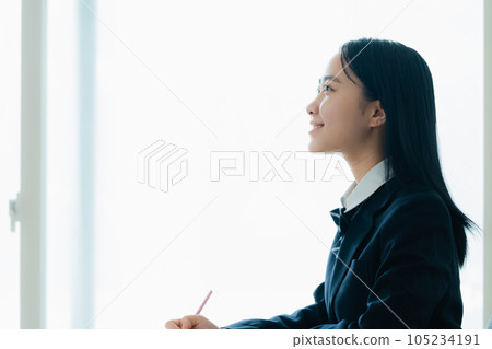 Female high school students studying 105234191