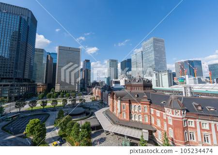 Clouds floating in the blue sky and the brick Tokyo Station below Clouds floating in the blue sky and the brick Tokyo Station below 105234474