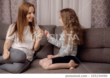 The relationship of mother and daughter. Mom cares and understands her daughter. High quality photo The relationship of mother and daughter. Mom cares and understands her daughter. High quality photo 105234490