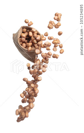 Peanut flying in sack bag, brown grain peanuts throw abstract float. Beautiful complete seed pea peanut sack bag splash in air, food object design. White background isolated high speed shutter freeze Peanut flying in sack bag, brown grain peanuts throw abstract float. Beautiful complete seed pea peanut sack bag splash in air, food object design. White background isolated high speed shutter freeze 105234895