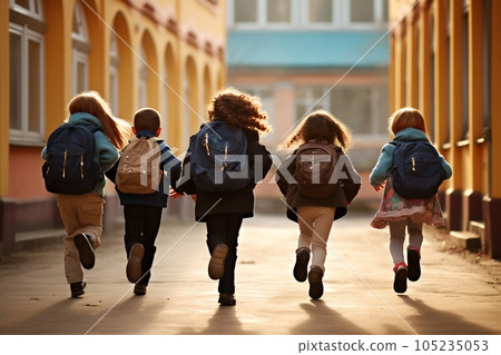 Group of elementary school kids running at school, back view. Back to school concept 105235053