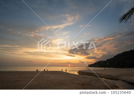 aerial view amazing sky above Karon beach Phuket at colorful sunset. aerial view amazing sky above Karon beach Phuket at colorful sunset. 105235640