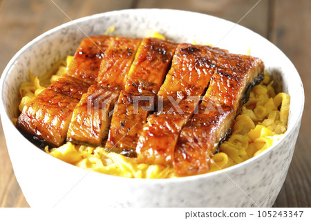 Kinshi tamago and eel kabayaki donburi Kinshi tamago and eel kabayaki donburi 105243347