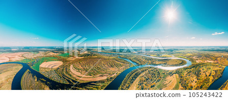 Panorama Aerial View Green Forest Woods And River Landscape In Sunny Spring Summer Day. Sunshine, Top View Of Nature, Bird's Eye View. Trees Standing In Water During Spring Flood floodwaters. woods in 105243422