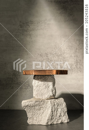 Rough stone and wooden box with sunlight from window on concrete wall and floor background,Copy space for product display Rough stone and wooden box with sunlight from window on concrete wall and floor background,Copy space for product display 105243816