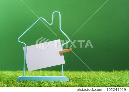 Real estate services consultation and advice home with blank mockup notice. house frame in green residential area. Finding new property or selling tips 105243939