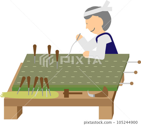 A tatami craftsman making tatami mats 105244900