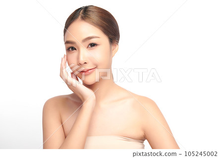 Beautiful young asian woman with clean fresh skin on white background, Face care, Facial treatment, Cosmetology, beauty and spa, Asian women portrait. Beautiful young asian woman with clean fresh skin on white background, Face care, Facial treatment, Cosmetology, beauty and spa, Asian women portrait. 105245002