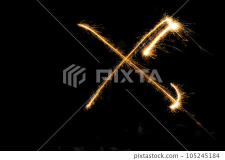 Draw an X with handheld fireworks Draw an X with handheld fireworks 105245184