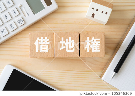 A block written as a leasehold, a calculator, a smartphone, and a miniature house A block written as a leasehold, a calculator, a smartphone, and a miniature house 105246369