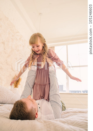 father with daughter having fun 105246603