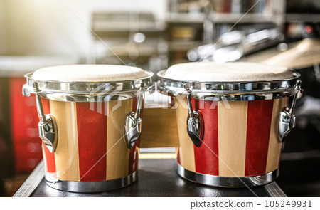 Colorful bongos drums in recording studio Colorful bongos drums in recording studio 105249931