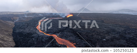 Aerial Panoramic view of Volcano Eruption, Litli Hrutur Hill, Fagradalsfjall Volcano System in Iceland. Reykjanes Peninsula. High Resolution Ultra Wide Image. Aerial Panoramic view of Volcano Eruption, Litli Hrutur Hill, Fagradalsfjall Volcano System in Iceland. Reykjanes Peninsula. High Resolution Ultra Wide Image. 105250123