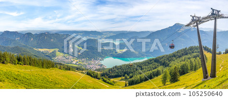 Landscape with cable car, lake Wolfgangsee and mountain Schafberg, view from the mountain Zwolferhorn Landscape with cable car, lake Wolfgangsee and mountain Schafberg, view from the mountain Zwolferhorn 105250640