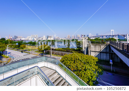 Sunny spring morning Rainbow Bridge from Odaiba Seaside Park Observation Deck Sunny spring morning Rainbow Bridge from Odaiba Seaside Park Observation Deck 105250872