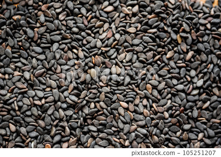 Close up of black sesame seed background top view. Close up of black sesame seed background top view. 105251207