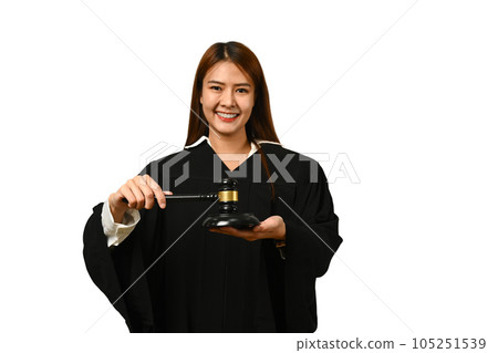 Portrait of judge dressed in robe gown uniform holding gavel hammer mallet isolated on white background 105251539