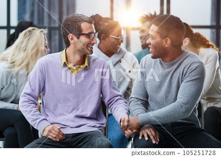 Happy multiethnic employees having fun while discussing project, sharing ideas, informal brainstorming sitting on chairs Happy multiethnic employees having fun while discussing project, sharing ideas, informal brainstorming sitting on chairs 105251728