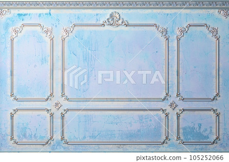 Classic wall of old gold stucco panels blue paint Classic wall of old gold stucco panels blue paint 105252066
