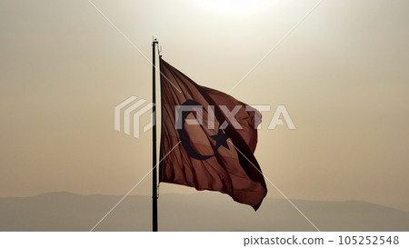 Aerial view of waving turkish flag in reverse light Aerial view of waving turkish flag in reverse light 105252548