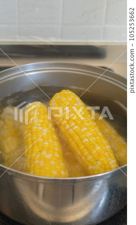 Boil the corn in a pan Boil the corn in a pan 105253662