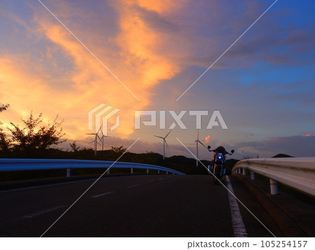 Sunrise, windmills and motorcycles Sunrise, windmills and motorcycles 105254157